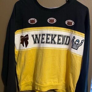 Hand designed football themed sweatshirt, women’s size medium